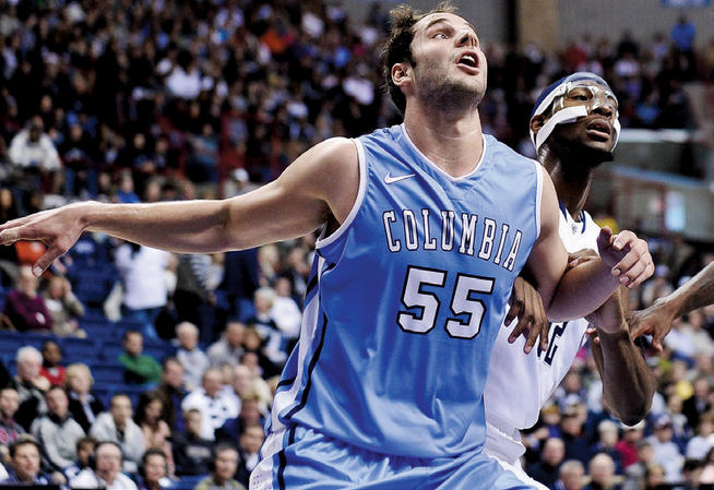 Columbia’s basketball fortunes could hinge on the progress of center Mark Cisco ’13, seen here boxing out for a rebound against Connecticut in the season opener. PHOTO: GEOFFREY BOLTE